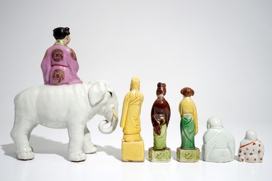 Six various Chinese famille rose and sancai-glazed figures, incl. a girl on an elephant, 19/20th C.