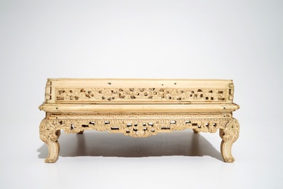 A large Chinese carved ivory stand, 18/19th C.