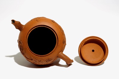 A Chinese Yixing teapot with applied vines, Kangxi
