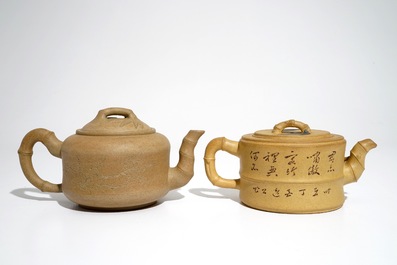 Two Chinese sand-coloured Yixing stoneware teapots, 20th C.