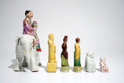 Six various Chinese famille rose and sancai-glazed figures, incl. a girl on an elephant, 19/20th C.