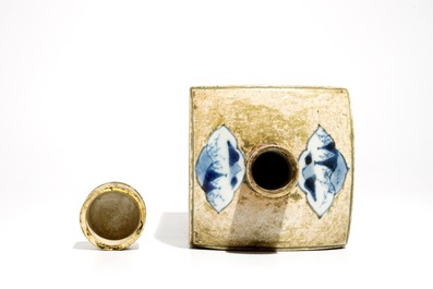 A square Japanese Arita blue and white bottle with biscuit frame, Edo, 17/18th C.