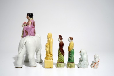 Six various Chinese famille rose and sancai-glazed figures, incl. a girl on an elephant, 19/20th C.