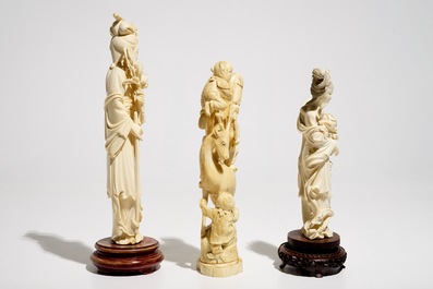 Two Chinese carved ivory figures of Guanyin and a Japanese okimono, 19/20th C.