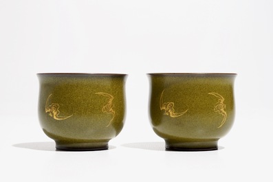 A pair of Chinese teadust-glazed and gilt wine cups with bats, Qianlong mark, 20th C.