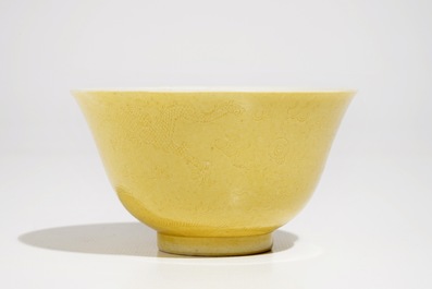 A Chinese yellow-glazed incised dragon bowl, Guangxu mark, 19/20th C.