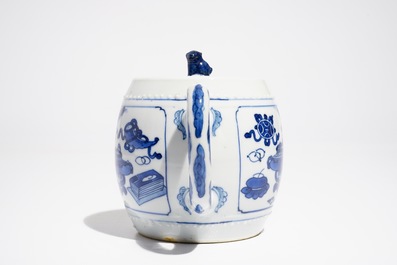 A Chinese blue and white teapot and cover with antiquities, Kangxi