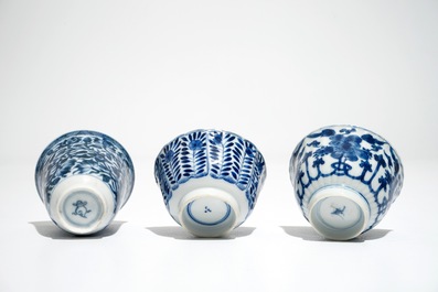 Thirteen Chinese blue and white cups and saucers, Kangxi and later