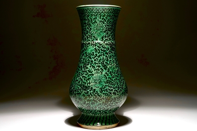 A rare Chinese verte-noire biscuit lotus scroll vase, Kangxi