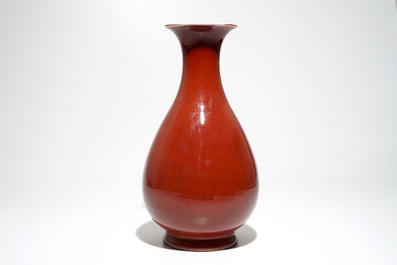 A Chinese monochrome red yuhuchunping vase, 19th C.