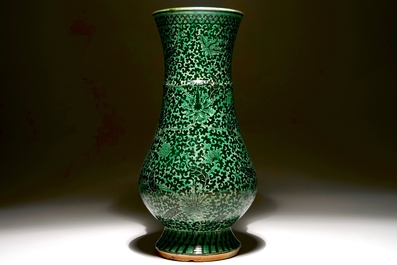 A rare Chinese verte-noire biscuit lotus scroll vase, Kangxi