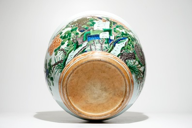 A Chinese famille verte fishbowl with birds among flowers, 19th C.