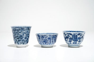 Thirteen Chinese blue and white cups and saucers, Kangxi and later