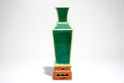 A tapered square Chinese vase on stand in green, yellow and orange, 19/20th C.