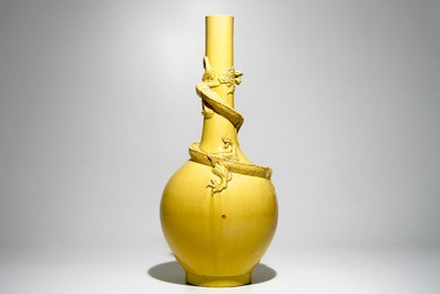 A tall Japanese Awaji monochrome yellow vase with applied dragon, Meiji, ca. 1900