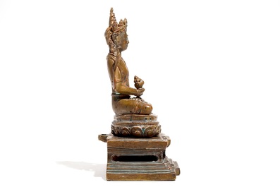 A Sino-Tibetan bronze model of Buddha Amitayus on a lotus throne, 19th C.