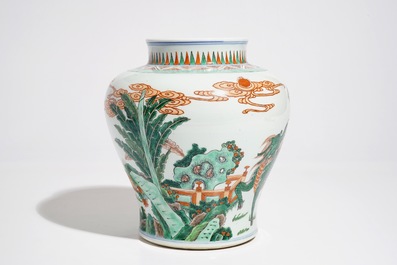 A Chinese wucai baluster vase with a kylin and a phoenix, 19th C.