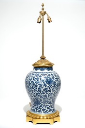 A Chinese ormolu-mounted blue and white baluster vase lamp, Kangxi