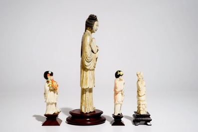 Four Chinese ivory figures on wooden bases, 19/20th C.