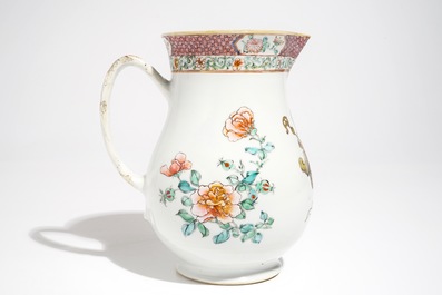 A large Chinese famille rose armorial jug with floral design, Yongzheng