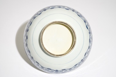 A Chinese blue and white bowl, Qianlong, and an iron red dish, 19th C.