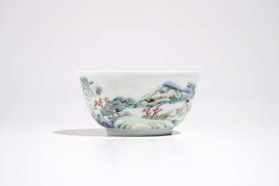 A Chinese famille rose cup and saucer with landscape design, Yongzheng