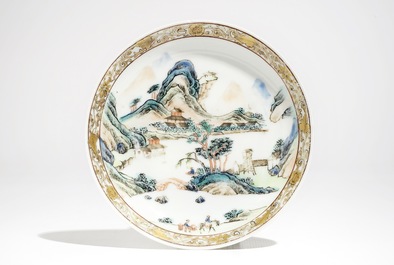 Une tasse et soucoupe en porcelaine de Chine famille rose &agrave; d&eacute;cor d'un paysage, Yongzheng