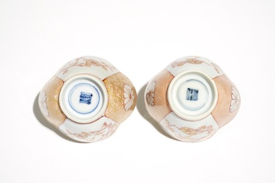 A pair of Chinese milk and blood quatrefoil cups and saucers, Kangxi