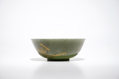 A Chinese spinach green jade engraved and gilt bowl, 19/20th C.