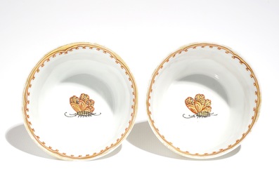 A pair of Chinese cups and saucers with gilt design, Yongzheng/Qianlong