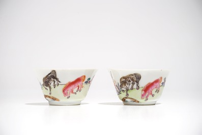 A pair of Chinese famille rose cups and saucers with horse design, Yongzheng/Qianlong