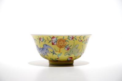 A Chinese famille rose yellow-ground bowl with bats and peaches, Guangxu mark, 19/20th C.