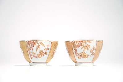 A pair of Chinese milk and blood quatrefoil cups and saucers, Kangxi