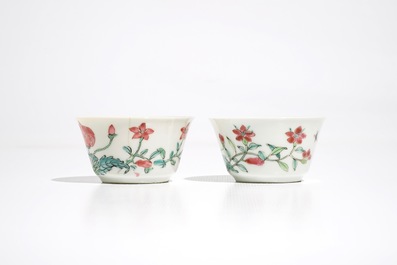 Two Chinese famille rose cups and three saucers with floral design, Yongzheng/Qianlong