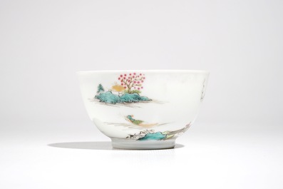 A Chinese famille rose cup and saucer with landscape design, Yongzheng/Qianlong