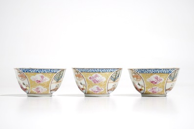 Three Chinese famille rose and gilt cups and saucers, Yongzheng/Qianlong