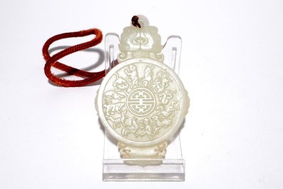 A Chinese jade amulet with zodiac design, 20e eeuw