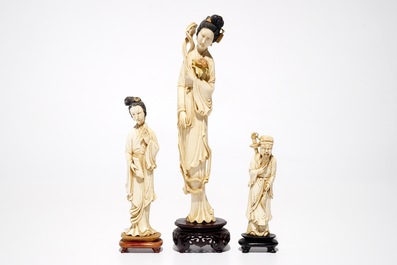 Three Chinese ivory figures on wooden bases, 19/20th C.