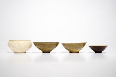 Four Chinese monochrome celadon- and cream-glazed bowls, Song and later