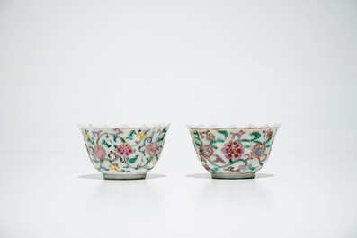 A pair of Chinese lobed famille rose cups and saucers, Yongzheng