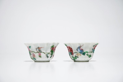 A pair of Chinese lobed famille rose cups and saucers, Yongzheng