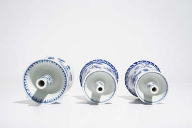 Five Chinese blue and white candlesticks, 19/20th C.