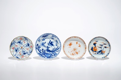 Seven Chinese blue and white, Imari style and famille rose cups and four saucers, Kangxi/Qianlong