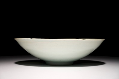 A Chinese incised qingbai foliate bowl with underglaze floral design, Song