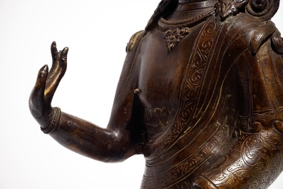 Een grote bronzen figuur van Boeddha Dipankara, Nepal, 18/19e eeuw