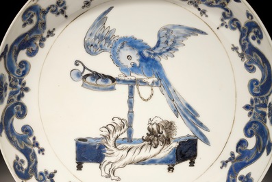 A pair of Chinese Pronk studio eggshell plates with parrots on a perch, Yongzheng/Qianlong