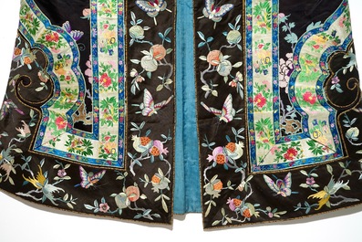A Chinese embroidered silk woman's robe with butterflies and fruits, Qing