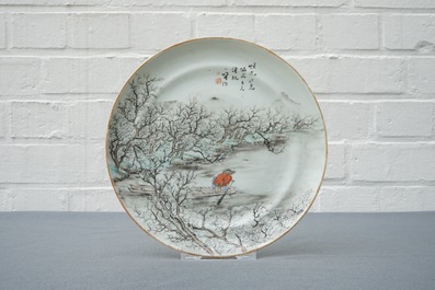 A Chinese qianjiang cai plate with a fisherman, 19/20th C.