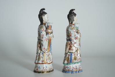 Two large Chinese famille rose candle holders modelled as court ladies, Qianlong
