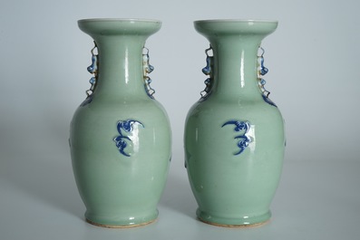 A pair of Chinese celadon-ground vases with blue and white figures, 19th C.
